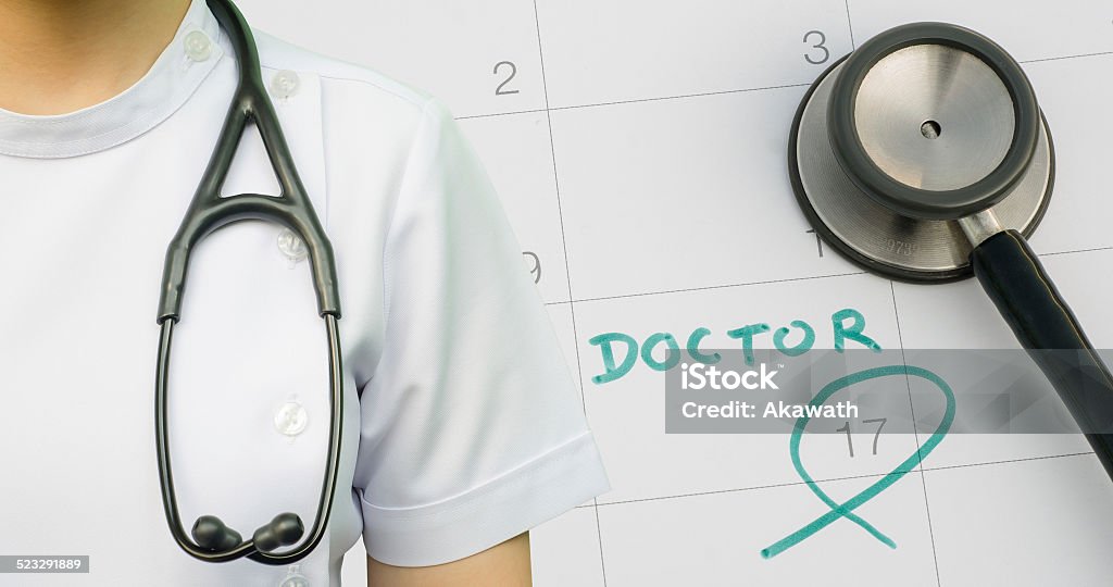 Note of doctor appointment on calendar Annual Event Stock Photo
