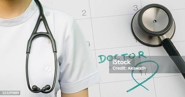 Note Of Doctor Appointment On Calendar Stock Photo - Download Image Now - Annual Event, Medical Exam, Adhesive Note