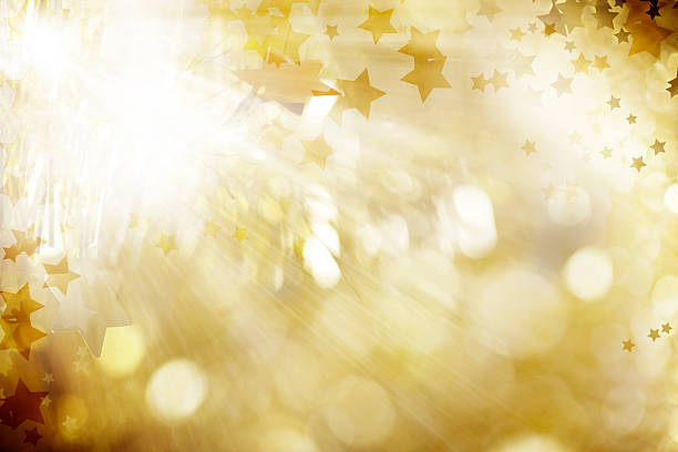istock Gold Defocused Light Background For Christmas With Stars 523312085