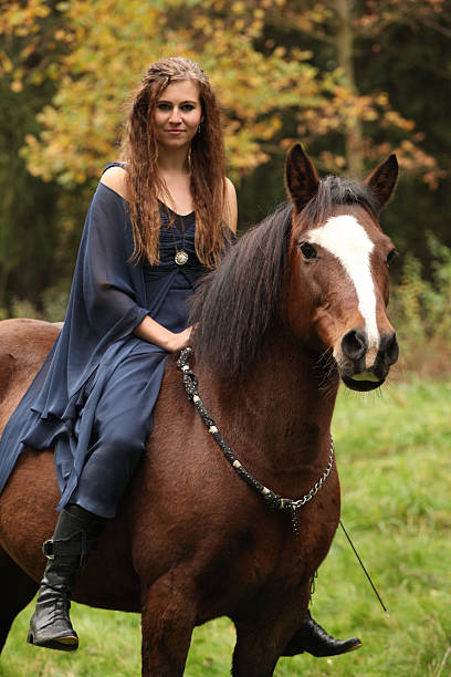 istock Pretty woman with pony - NHS 523314695