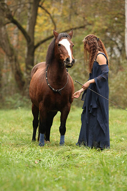 istock Pretty woman with pony - NHS 523314881