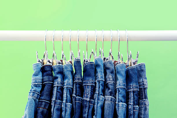 istock Row of hanged blue jeans 523314943