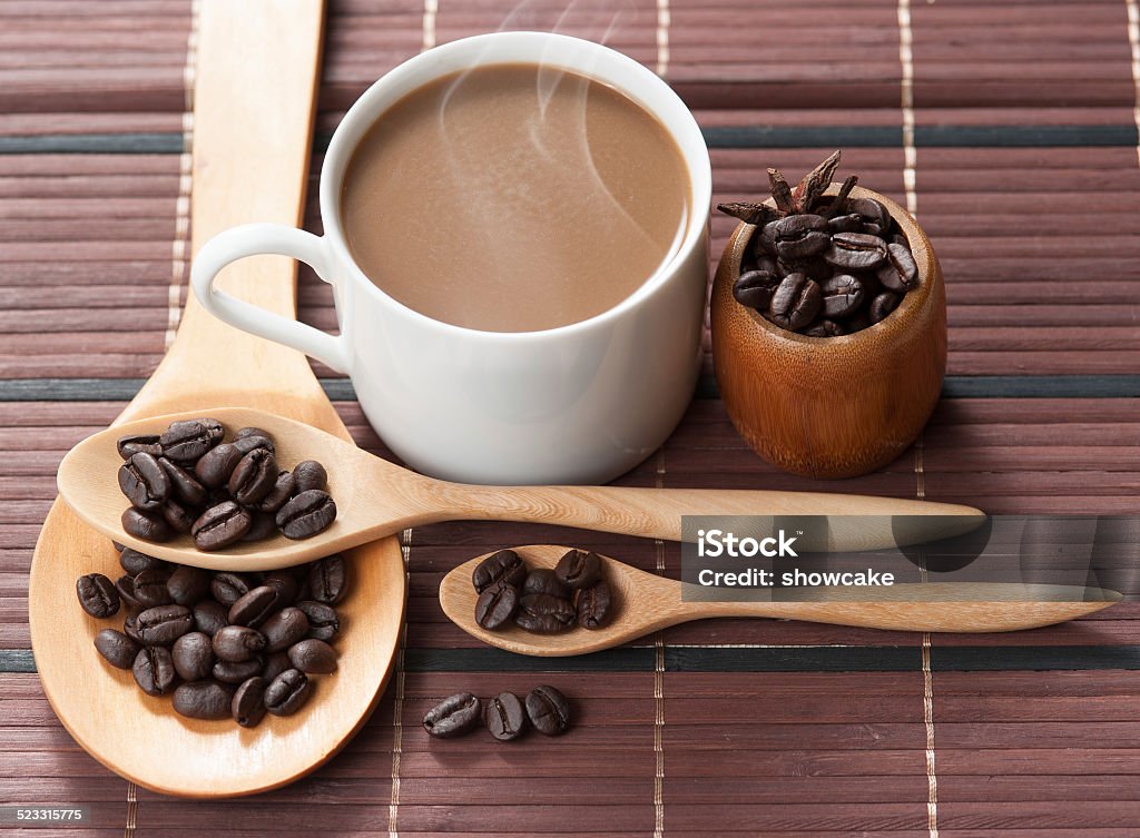 cup of coffee and Wooden Spoon cup of coffee and Wooden Spoon on wood table Backgrounds Stock Photo
