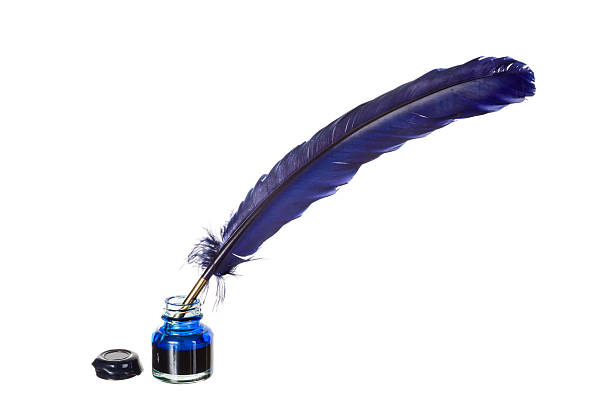 istock Blue ink and quill feather 523354165