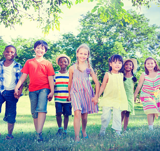 istock Diverse Children Friendship Playing Outdoors Concept 523355573