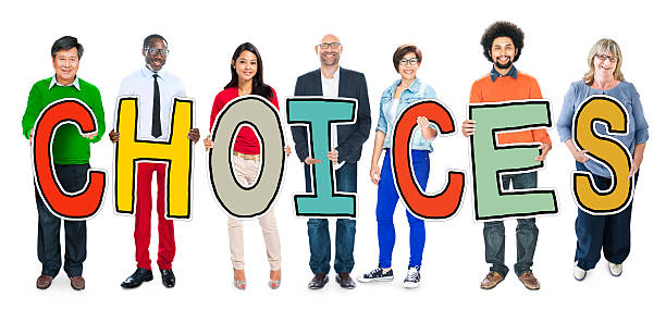 istock Multiethnic Group of People Holding Letter Choices 523355601