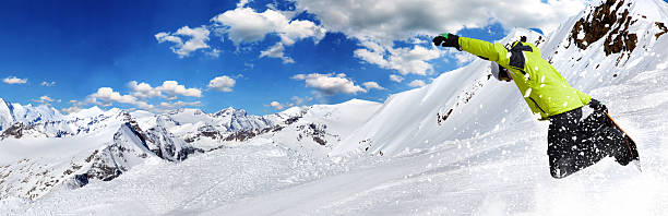 istock Snowboarder in high mountains 523355753