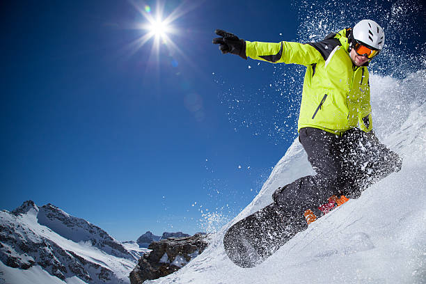 istock Snowboarder in high mountains 523356019