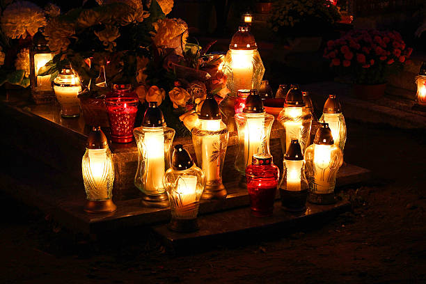 Candles to the cemetery at night stock photo
