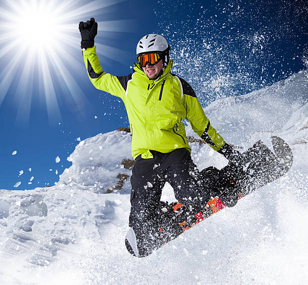 istock Snowboarder in high mountains 523357243