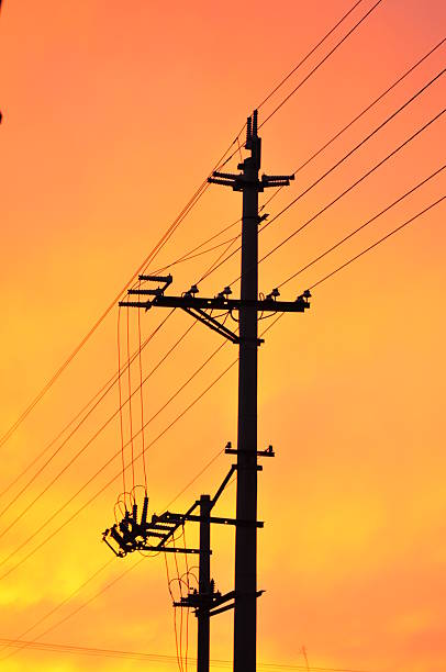 istock The sunset silhouette of the telegraph pole and wire 523357963