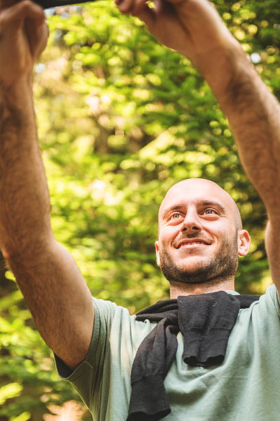 istock man take a selfie on the woods 523360261