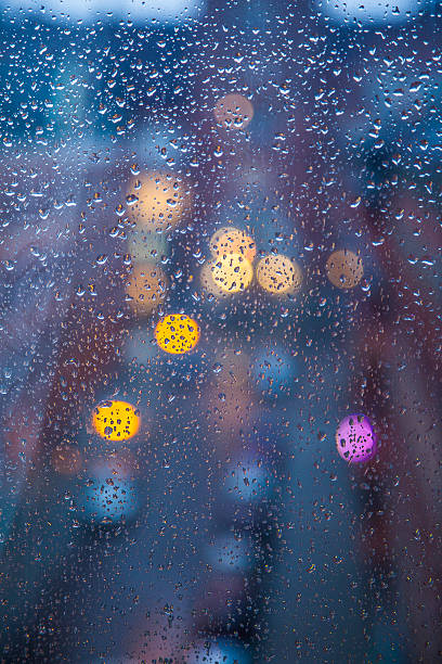 istock Rainy days,Rain drops on window,rainy weather,rain background 523360937