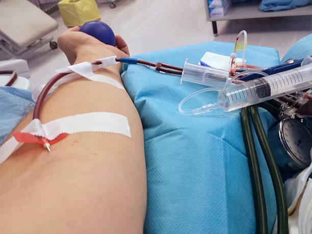 istock blood transfusion on a young man in a hospital 523377349