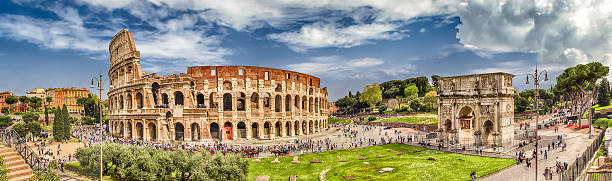 Panoramic view of the Colosseum and Arch of Constantine, Rome Panoramic aerial view of the Colosseum and Arch of Constantine, Rome, Italy coliseum rome stock pictures, royalty-free photos & images