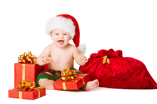 Christmas Baby Kids, Present Gift Box And Santa Bag, Child Happy Smiling In Red Hat With Xmas Sackful, Isolated White Background