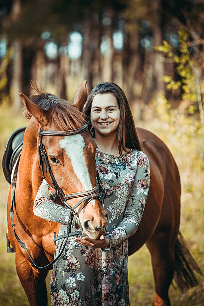 istock Girl with a horse 523379870
