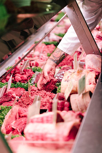 Serving in a Butcher's Shop