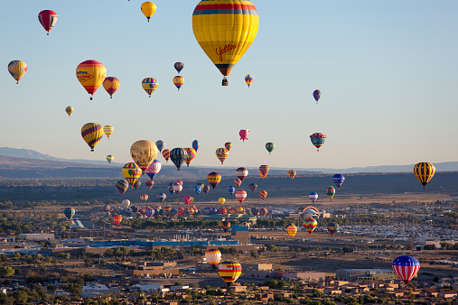 Albuquerque, New Mexico - USA - Oct 8, 2023: Several hot air balloons preparing to launch at the Albuquerque International Balloon Fiesta