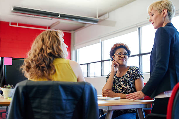 istock Unposed group of creative business people in an open concept 523382706