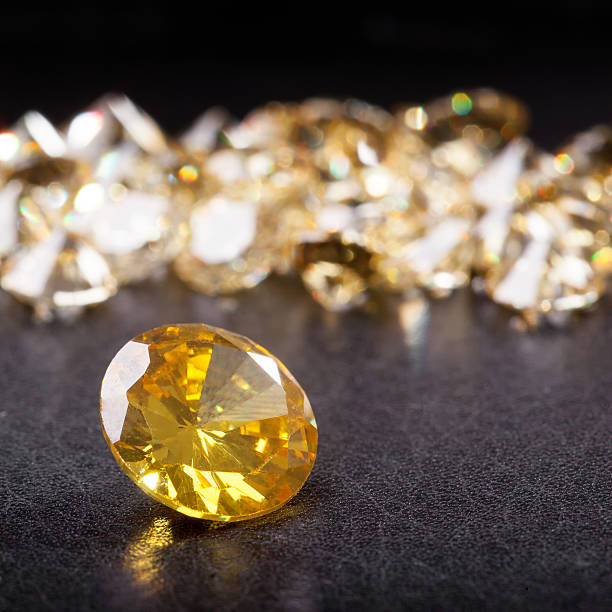 istock Natural Citrine stones on black bacground 523384355