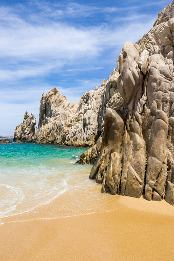 Lover's Beach, accessible only by boat or sea taxi, has pristine sand, coral waters, and rugged rocks. The beach is located near the marina of Cabo San Lucas in the Sea of Cortez at Land's End.