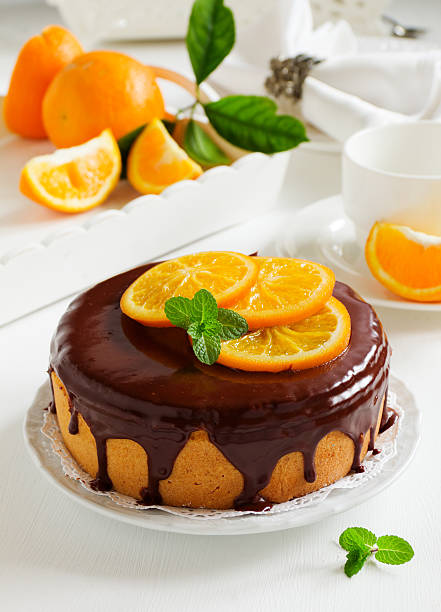 istock Orange cake with chocolate and orange slices. 523384791