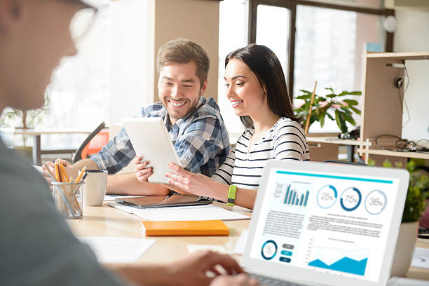 istock Positive colleagues sitting at the table 523385458