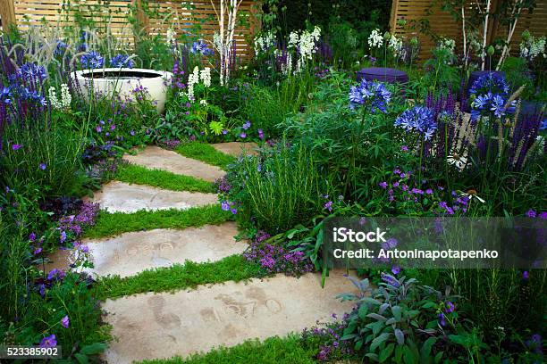 Garden Path Stock Photo - Download Image Now - Garden Path, Flowerbed, Stone Material