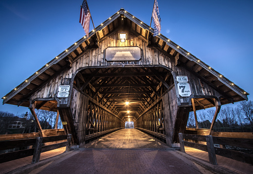 Covered bridge in the town of Frankemuth, Michigan. The local landmark spans the Cass River in the tourist town of Frankenmuth. The bridge is open to autos and pedestrians year around.