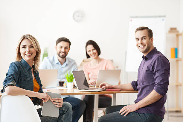 istock Skillful four colleagues are expressing positive emotions 523388174