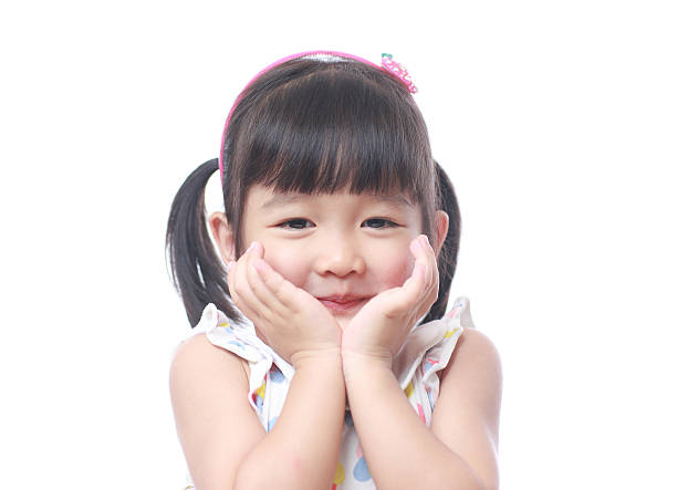 istock Cute little girl isolated on white 523388492