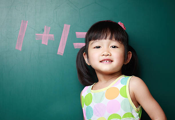 istock Cute asia children do arithmetic 523388820