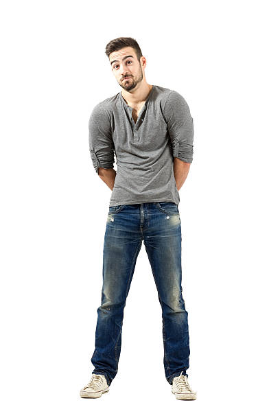 istock Confused young man with raised shoulders 523390599