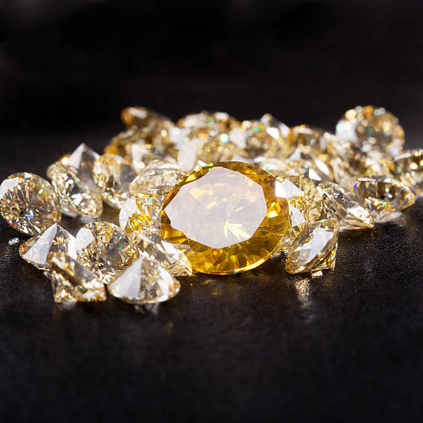 istock Natural Citrine stones on black bacground 523390789