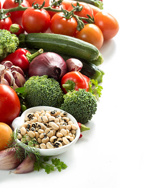 istock Raw black eyed  peas and vegetables 523391805