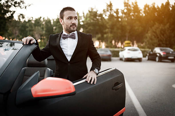 istock Man And Convertible Car 523391956