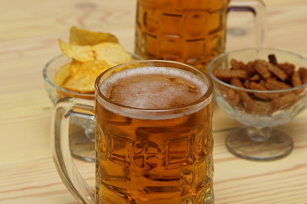 istock mug of light beer on the table 523392260