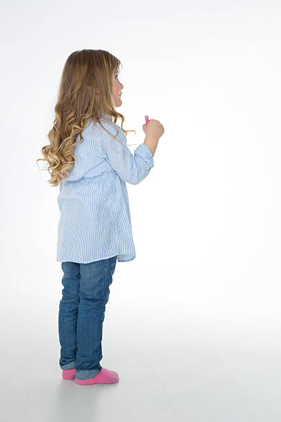 istock profile of little child standing 523393131