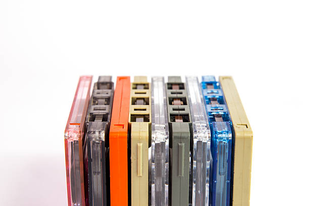 istock Old cassette tapes on white background 523393890
