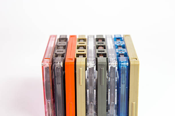 istock Old cassette tapes on white background 523393916