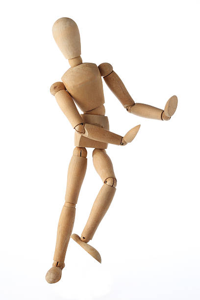 istock mannequin old wooden dummy dancing thai style isolated on white 523394639
