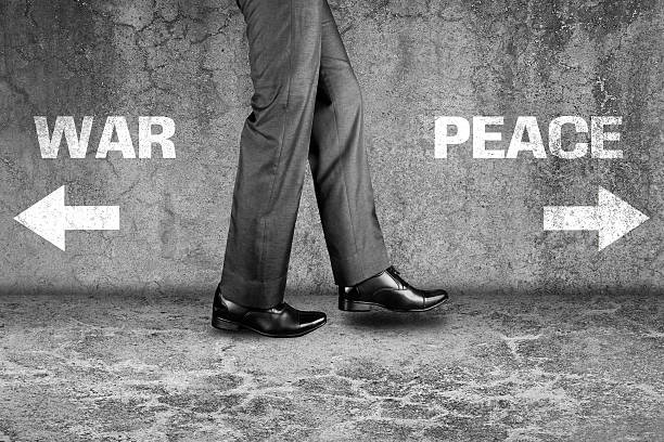istock War or Peace way written text on dirty wall 523394670