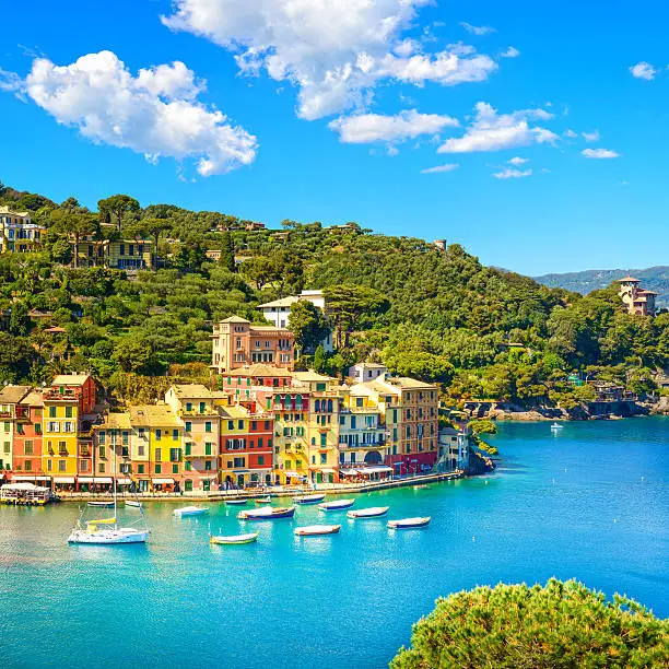 Portofino luxury landmark aerial panoramic view. Village and yacht in little bay harbor. Liguria, Italy