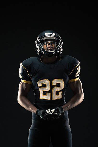 istock Football Player Looking Up 523395402