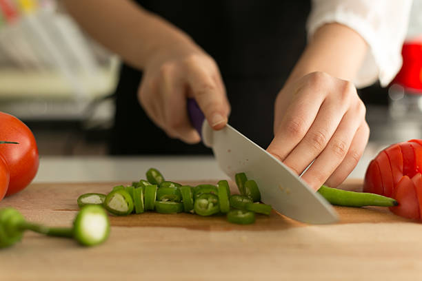 istock Woman Cutting Pepper 523395741