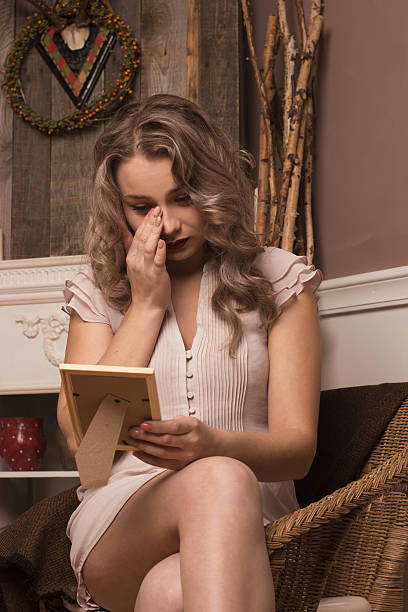 istock sad girl looking at photo 523395959