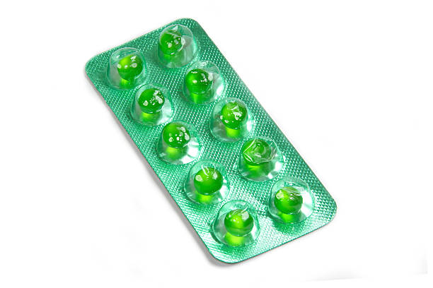 istock Green flatulence pill in the blister pack 523396044