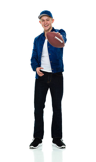 istock Smiling male holding American ball 523396764