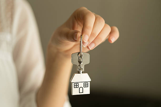 istock Woman Holding House Keys 523397623